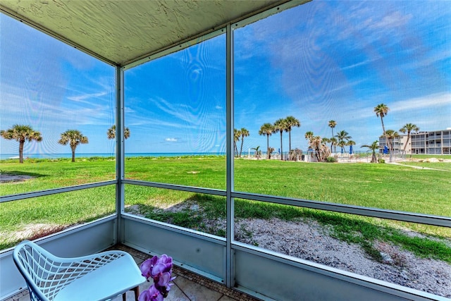 4805 Gulf Of Mexico Dr Unit 105, Longboat Key, FL 34228 - sunroom / solarium featuring a water view