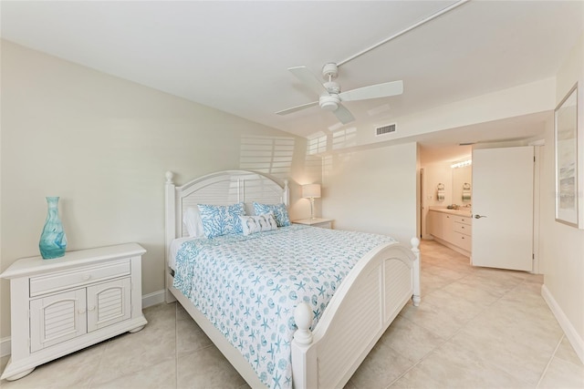 4805 Gulf Of Mexico Dr Unit 105, Longboat Key, FL 34228 - bedroom with light tile patterned floors, ceiling fan, vaulted ceiling, and ensuite bath