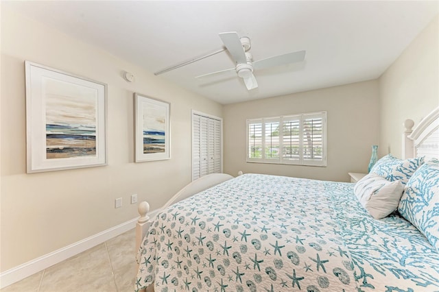 4805 Gulf Of Mexico Dr Unit 105, Longboat Key, FL 34228 - bedroom with light tile patterned floors, ceiling fan, and a closet