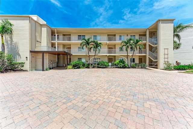 4805 Gulf Of Mexico Dr Unit 105, Longboat Key, FL 34228 - view of apartment building / complex