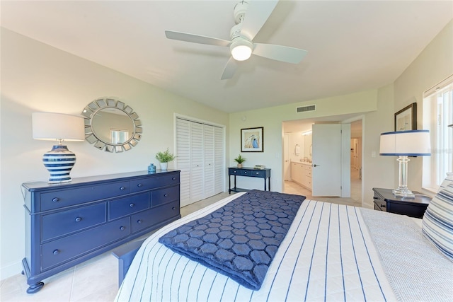 4805 Gulf Of Mexico Dr Unit 105, Longboat Key, FL 34228 - bedroom with a closet, a ceiling fan, and ensuite bathroom