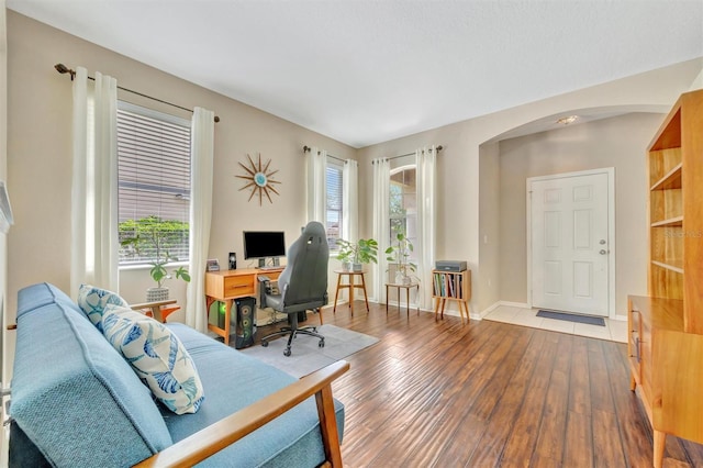 14255 Gnatcatcher Ter, Lakewood Ranch, FL 34202 - office space featuring arched walkways and light wood-style flooring
