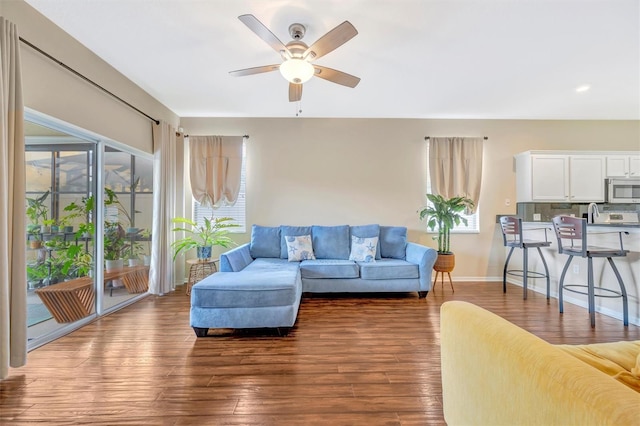 14255 Gnatcatcher Ter, Lakewood Ranch, FL 34202 - living room featuring ceiling fan and wood finished floors