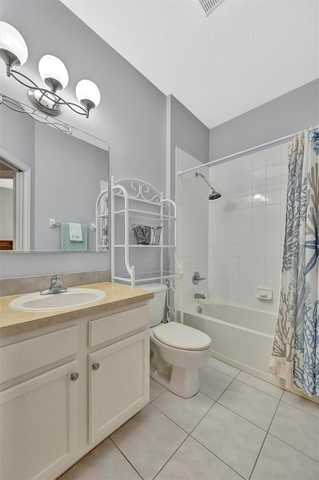 14255 Gnatcatcher Ter, Lakewood Ranch, FL 34202 - full bath featuring tile patterned floors, vanity, and shower / bath combo with shower curtain