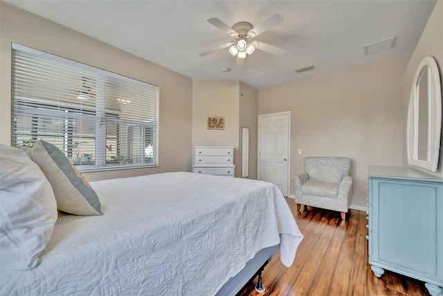 14255 Gnatcatcher Ter, Lakewood Ranch, FL 34202 - bedroom featuring wood finished floors and a ceiling fan
