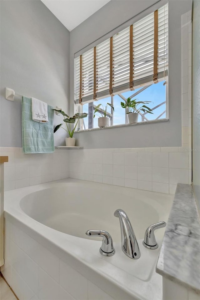 14255 Gnatcatcher Ter, Lakewood Ranch, FL 34202 - bathroom with a garden tub