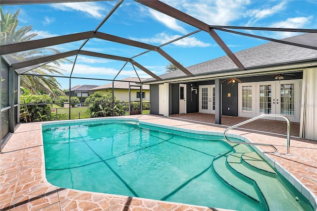 80 Rio Cuarto St, Punta Gorda, FL 33983 - outdoor pool with french doors, a patio, and glass enclosure