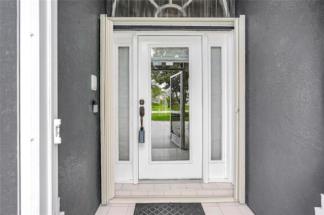 80 Rio Cuarto St, Punta Gorda, FL 33983 - entrance to property featuring stucco siding
