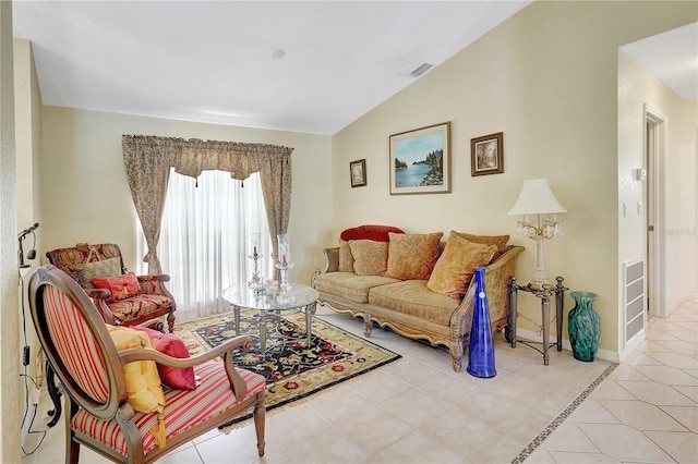 80 Rio Cuarto St, Punta Gorda, FL 33983 - tiled living room featuring vaulted ceiling