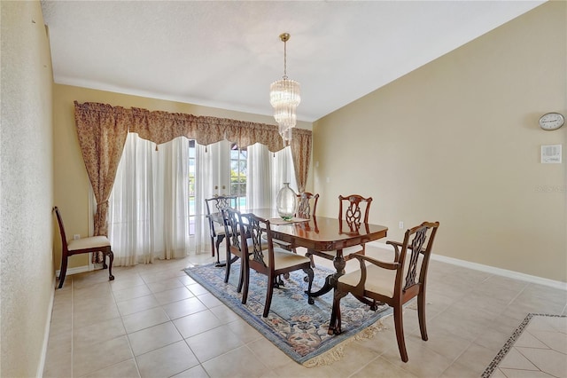 80 Rio Cuarto St, Punta Gorda, FL 33983 - dining space with a chandelier and light tile patterned flooring