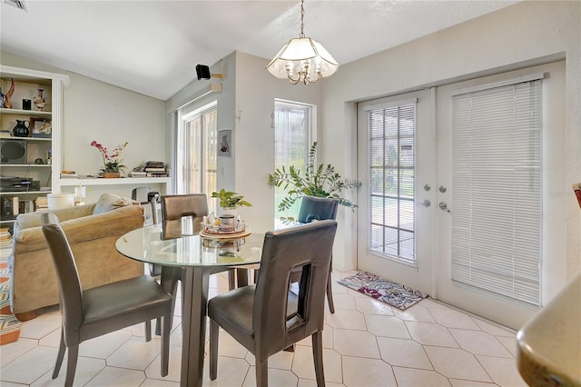 80 Rio Cuarto St, Punta Gorda, FL 33983 - dining area featuring lofted ceiling and a chandelier
