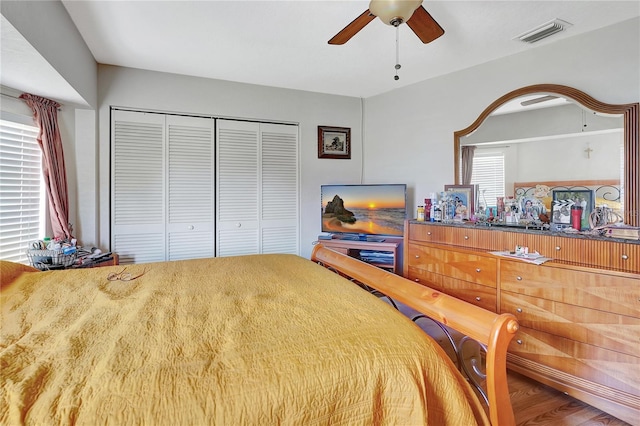 80 Rio Cuarto St, Punta Gorda, FL 33983 - bedroom featuring a closet, a ceiling fan, and wood finished floors