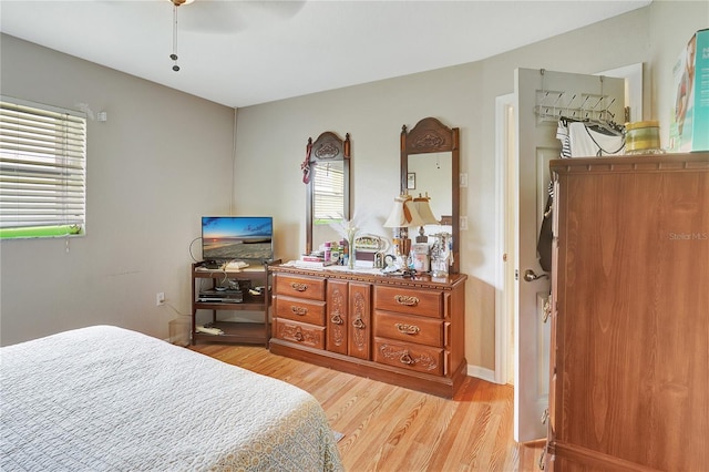 80 Rio Cuarto St, Punta Gorda, FL 33983 - bedroom with light wood-type flooring and a ceiling fan