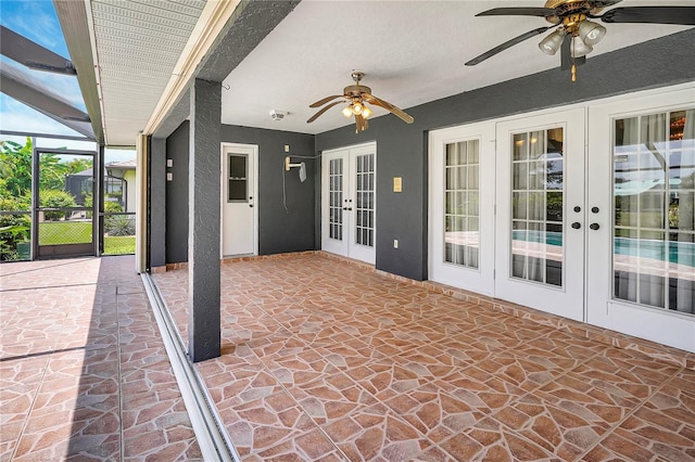 80 Rio Cuarto St, Punta Gorda, FL 33983 - view of patio with french doors, a ceiling fan, and a lanai