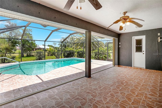 80 Rio Cuarto St, Punta Gorda, FL 33983 - swimming pool with ceiling fan, a patio, and glass enclosure