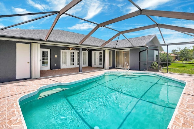 80 Rio Cuarto St, Punta Gorda, FL 33983 - swimming pool with french doors, a patio area, and a lanai