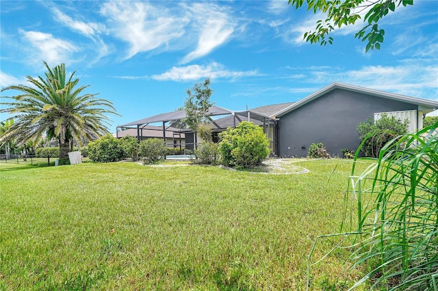 80 Rio Cuarto St, Punta Gorda, FL 33983 - view of green lawn with a lanai
