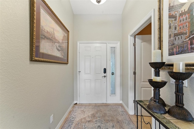 194 Sunset Rd, Rotonda West, FL 33947 - foyer with baseboards