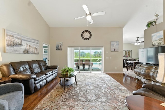 194 Sunset Rd, Rotonda West, FL 33947 - living area with a ceiling fan, wood finished floors, and lofted ceiling