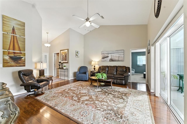 194 Sunset Rd, Rotonda West, FL 33947 - living area with hardwood / wood-style flooring, a ceiling fan, and high vaulted ceiling