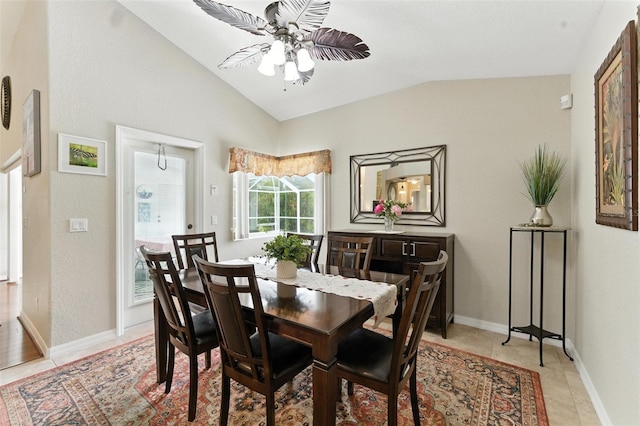 194 Sunset Rd, Rotonda West, FL 33947 - dining room featuring lofted ceiling, a ceiling fan, and light tile patterned floors