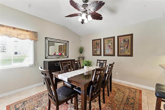 194 Sunset Rd, Rotonda West, FL 33947 - dining room with lofted ceiling, a ceiling fan, and light tile patterned floors