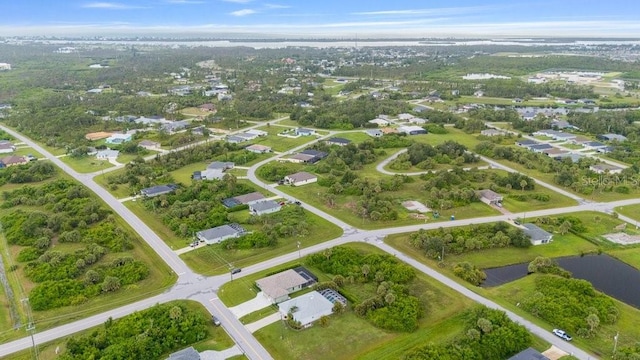 194 Sunset Rd, Rotonda West, FL 33947 - aerial view of property and surrounding area with a large body of water