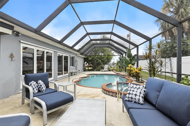 326 Mann Ave SE, Port Charlotte, FL 33952 - view of swimming pool with a patio, outdoor lounge area, and glass enclosure