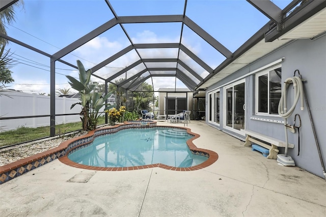 326 Mann Ave SE, Port Charlotte, FL 33952 - view of pool featuring a patio area, a pool with connected hot tub, and a lanai