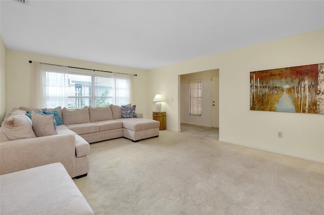 4339 Bowling Green Cir Unit 19, Sarasota, FL 34233 - living area featuring carpet and baseboards