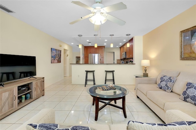 4339 Bowling Green Cir Unit 19, Sarasota, FL 34233 - living room with ceiling fan, light tile patterned flooring, and recessed lighting
