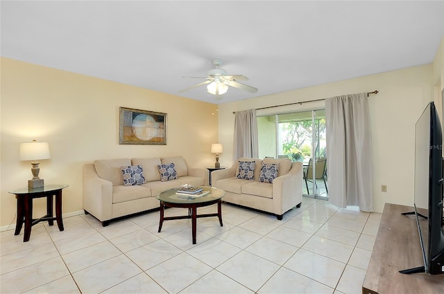 4339 Bowling Green Cir Unit 19, Sarasota, FL 34233 - living area with light tile patterned flooring and ceiling fan