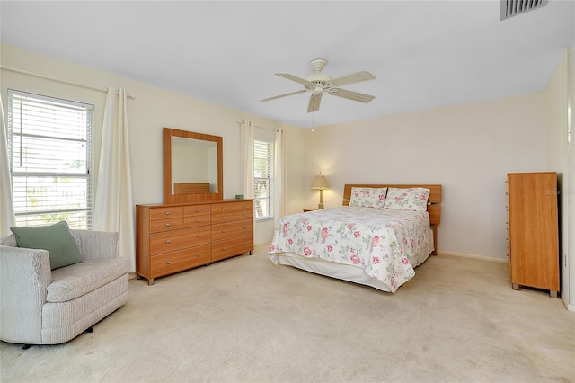 4339 Bowling Green Cir Unit 19, Sarasota, FL 34233 - bedroom with carpet and a ceiling fan