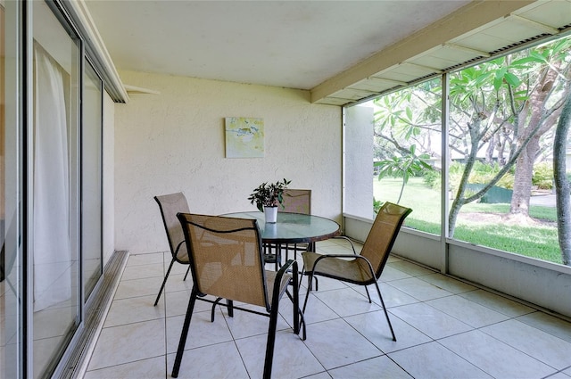 4339 Bowling Green Cir Unit 19, Sarasota, FL 34233 - sunroom / solarium with outdoor dining area