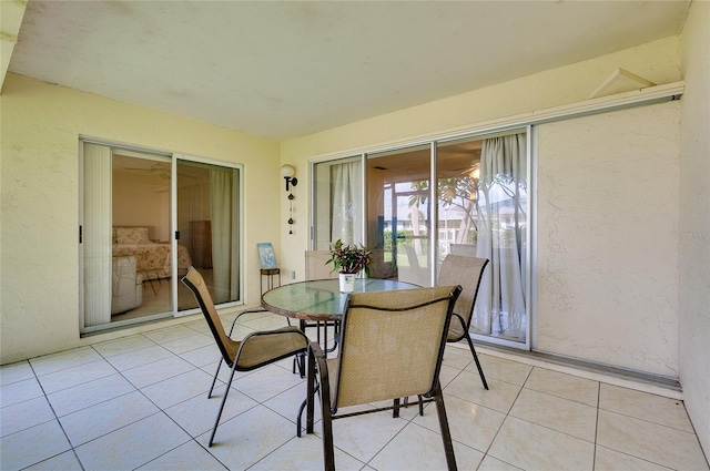 4339 Bowling Green Cir Unit 19, Sarasota, FL 34233 - sunroom / solarium featuring outdoor dining space