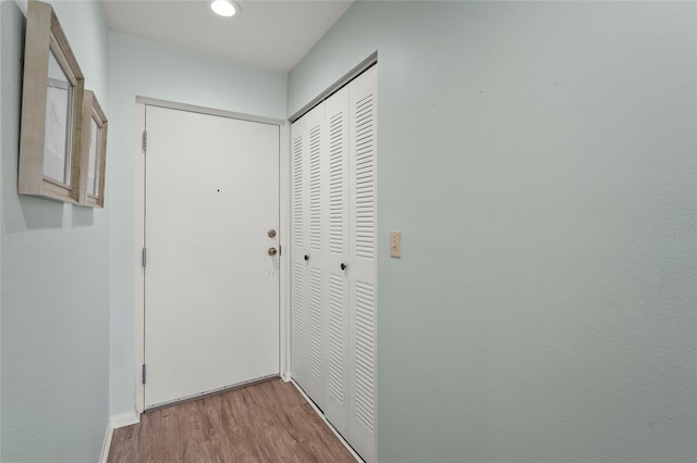 3705 E Bay Dr Unit 205, Holmes Beach, FL 34217 - corridor with wood finished floors and recessed lighting