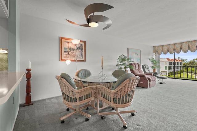 3705 E Bay Dr Unit 205, Holmes Beach, FL 34217 - carpeted dining area with ceiling fan