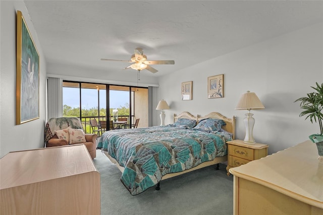 3705 E Bay Dr Unit 205, Holmes Beach, FL 34217 - carpeted bedroom with access to exterior and a ceiling fan