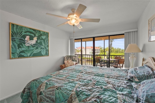 3705 E Bay Dr Unit 205, Holmes Beach, FL 34217 - carpeted bedroom featuring access to exterior and a ceiling fan