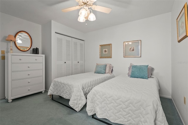 3705 E Bay Dr Unit 205, Holmes Beach, FL 34217 - carpeted bedroom with a closet and ceiling fan