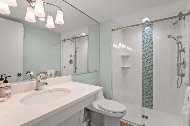 3705 E Bay Dr Unit 205, Holmes Beach, FL 34217 - bathroom featuring a shower stall and vanity