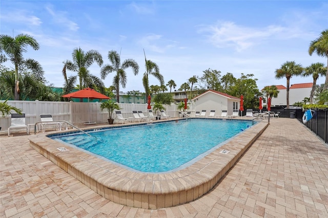3705 E Bay Dr Unit 205, Holmes Beach, FL 34217 - community pool with a patio area