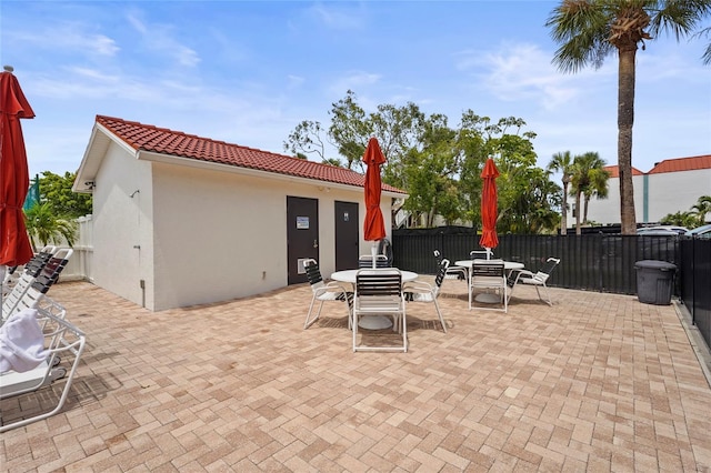 3705 E Bay Dr Unit 205, Holmes Beach, FL 34217 - view of patio with outdoor dining space