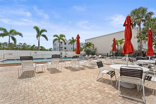 3705 E Bay Dr Unit 205, Holmes Beach, FL 34217 - view of patio / terrace with a community pool