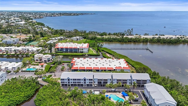 3705 E Bay Dr Unit 205, Holmes Beach, FL 34217 - drone / aerial view of a nearby body of water and a pool