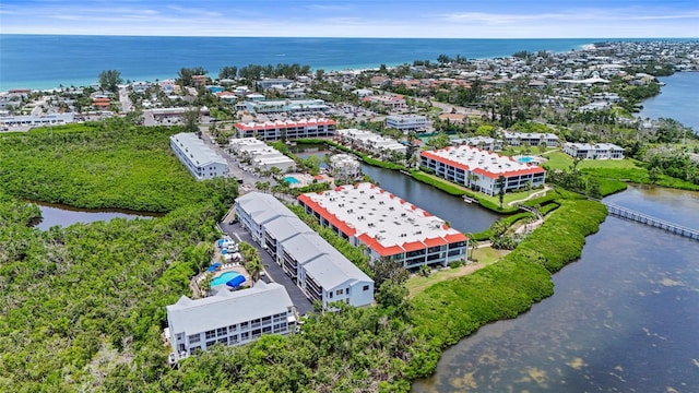 3705 E Bay Dr Unit 205, Holmes Beach, FL 34217 - bird's eye view of a large body of water and apartment complex