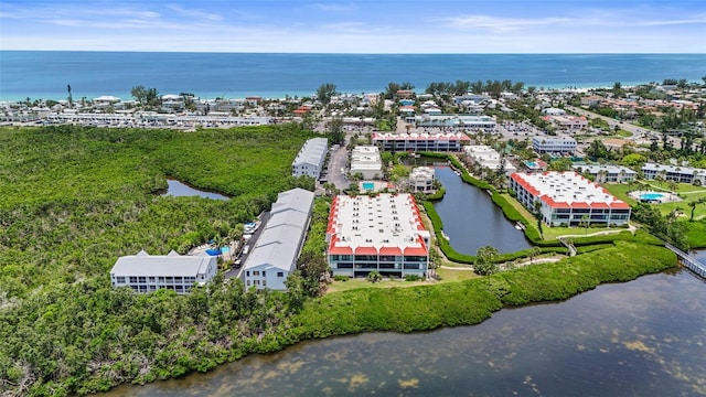 3705 E Bay Dr Unit 205, Holmes Beach, FL 34217 - aerial view of a large body of water and apartment complex