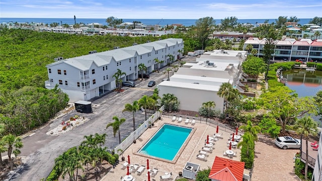 3705 E Bay Dr Unit 205, Holmes Beach, FL 34217 - aerial view of a nearby body of water and a pool area