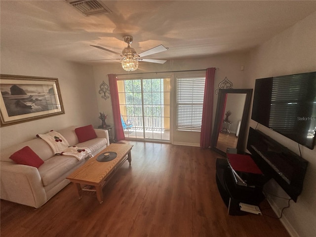 8809 White Sage Loop, Lakewood Ranch, FL 34202 - living area with a ceiling fan and wood finished floors