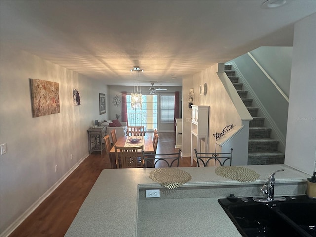 8809 White Sage Loop, Lakewood Ranch, FL 34202 - kitchen featuring dark wood-type flooring and a ceiling fan